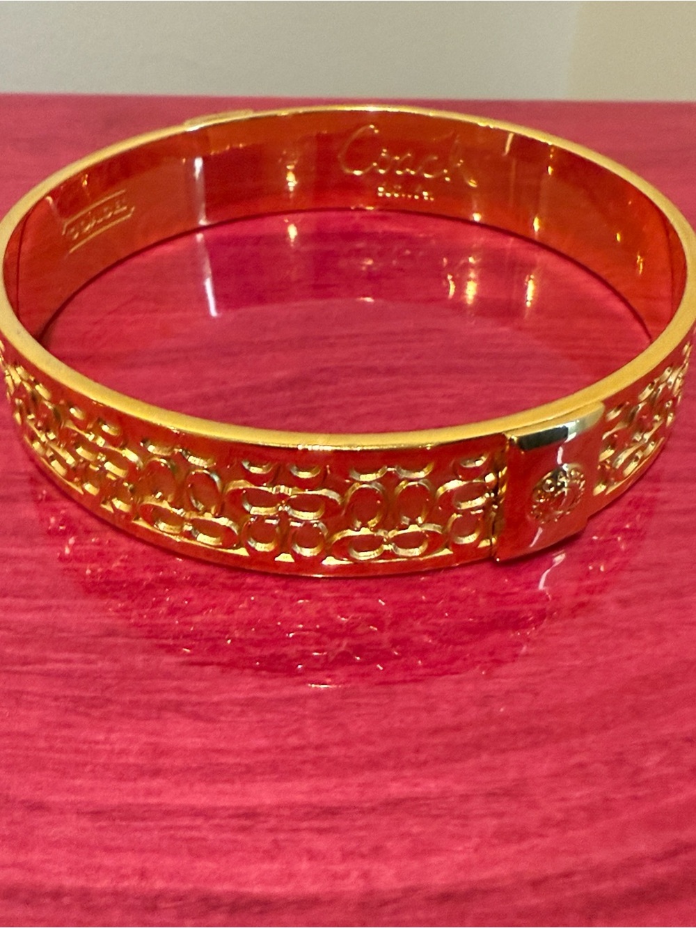 Coach Gold-Tone Logo Cutout Hinged Bangle Bracelet